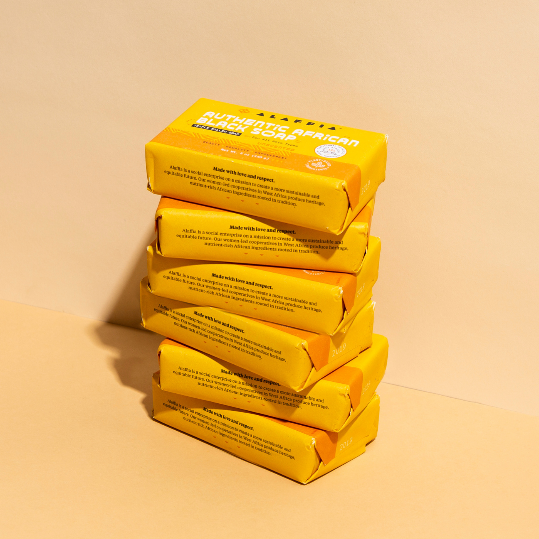 Stack of yellow soap bars with text on a beige background