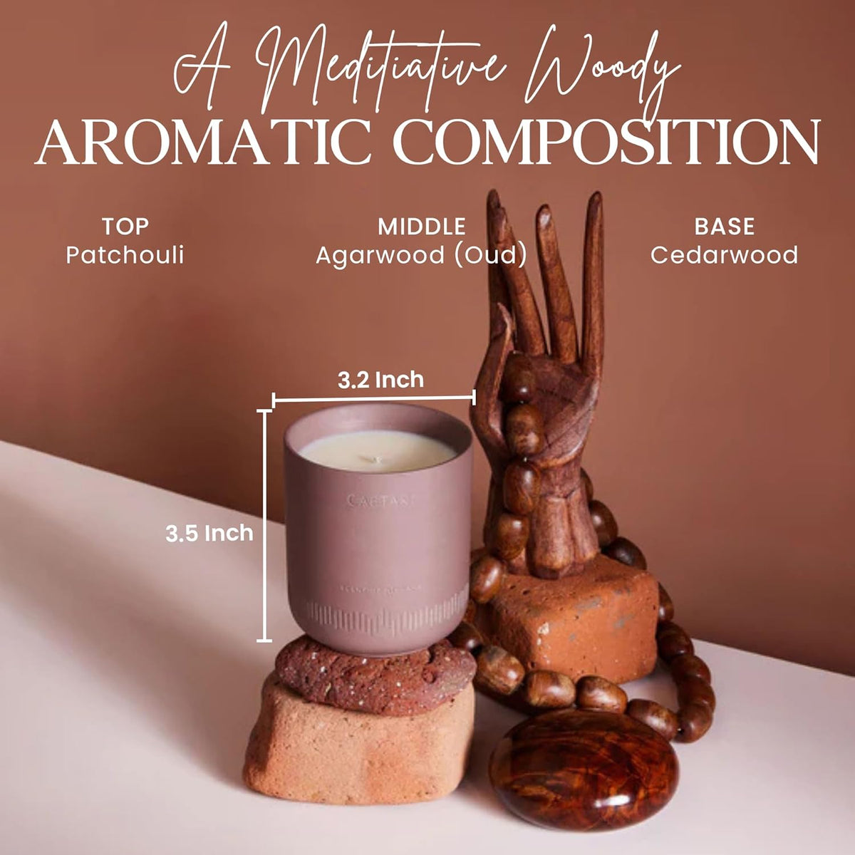 Scent of Nirvana candle styled with a wooden sculpture, with scent notes and dimension callouts