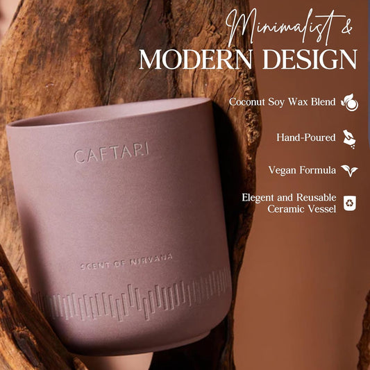 Scent of Nirvana candle in its ceramic vessel against a wooden background