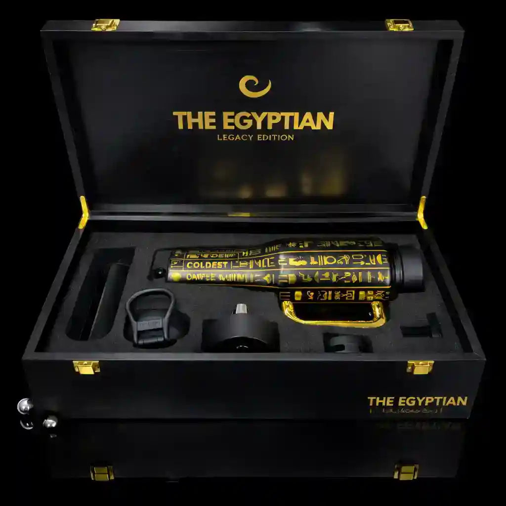 Black and gold grooming set in a 'The Egyptian' branded case on a black background