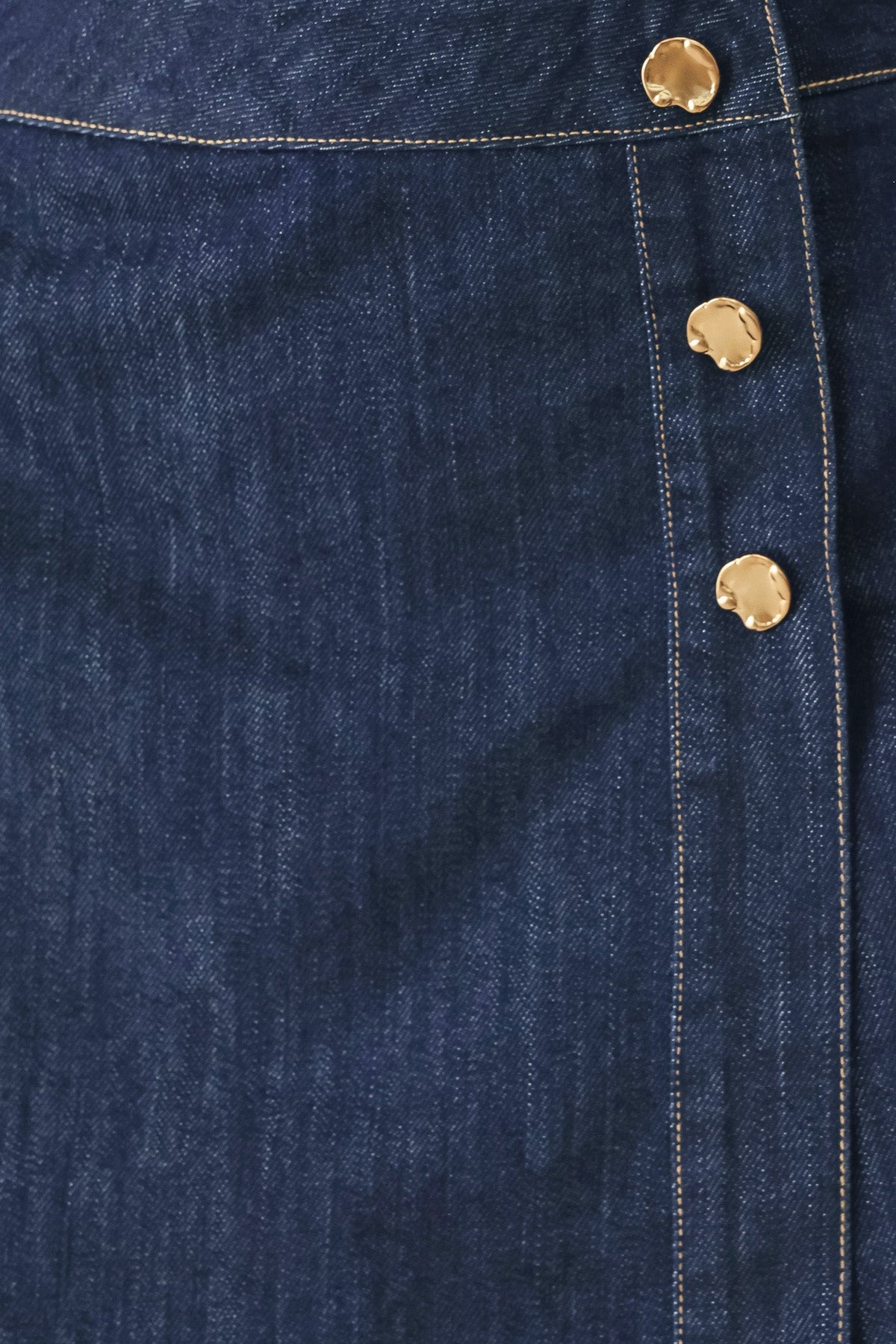 Close-up of the indigo cotton-blend denim fabric used for the Iconic Indigo skort.