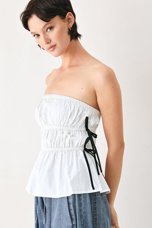 Crisp white strapless cotton top with a clean, minimalist silhouette.