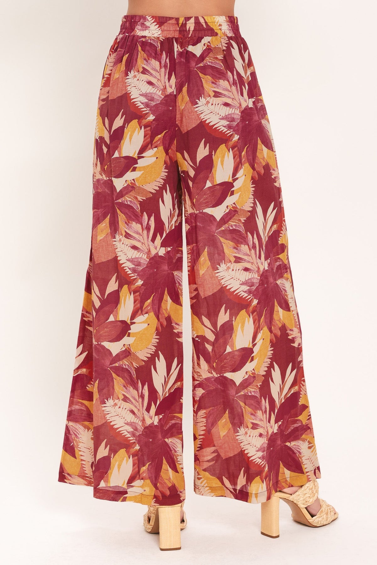 Detail of the burgundy floral cotton print used for the Resort Dream Palazzo wide-leg pants.