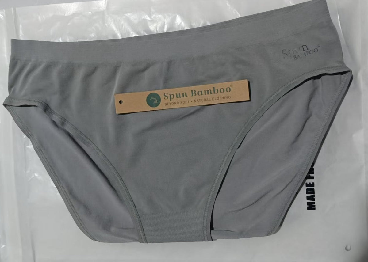 Gray underwear with a 'Spun Bamboo' label on a clear background