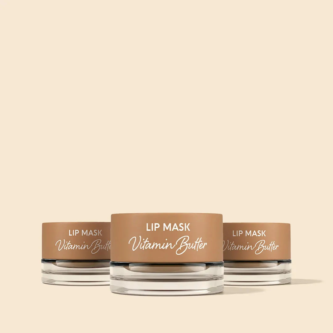 Three jars of Lip Mask Vitamin Butter on a beige background
