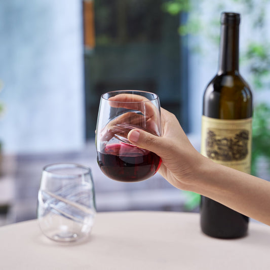 Stemless acrylic wine glass from the Barcelona set, showing the finger indent in the side