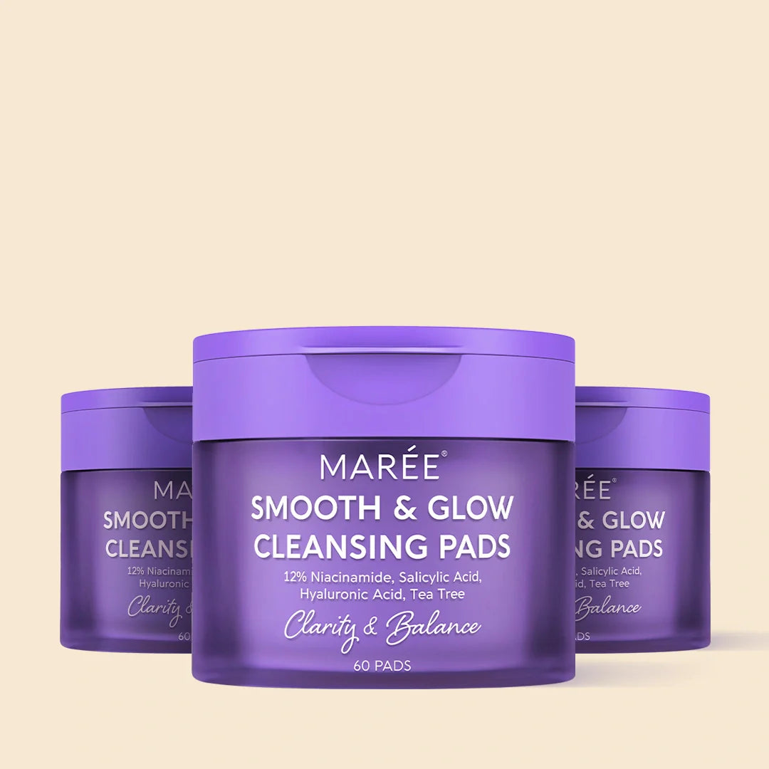 Purple containers of Maré Smooth & Glow Cleansing Pads on a beige background