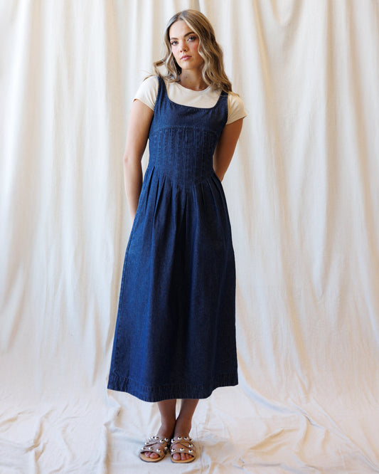 a women wearing blue dress.