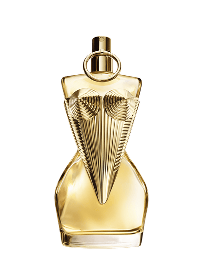 A gold-toned perfume bottle shaped like a stylized female torso with a ring handle and ribbed bust details, shown against a solid dark green background.