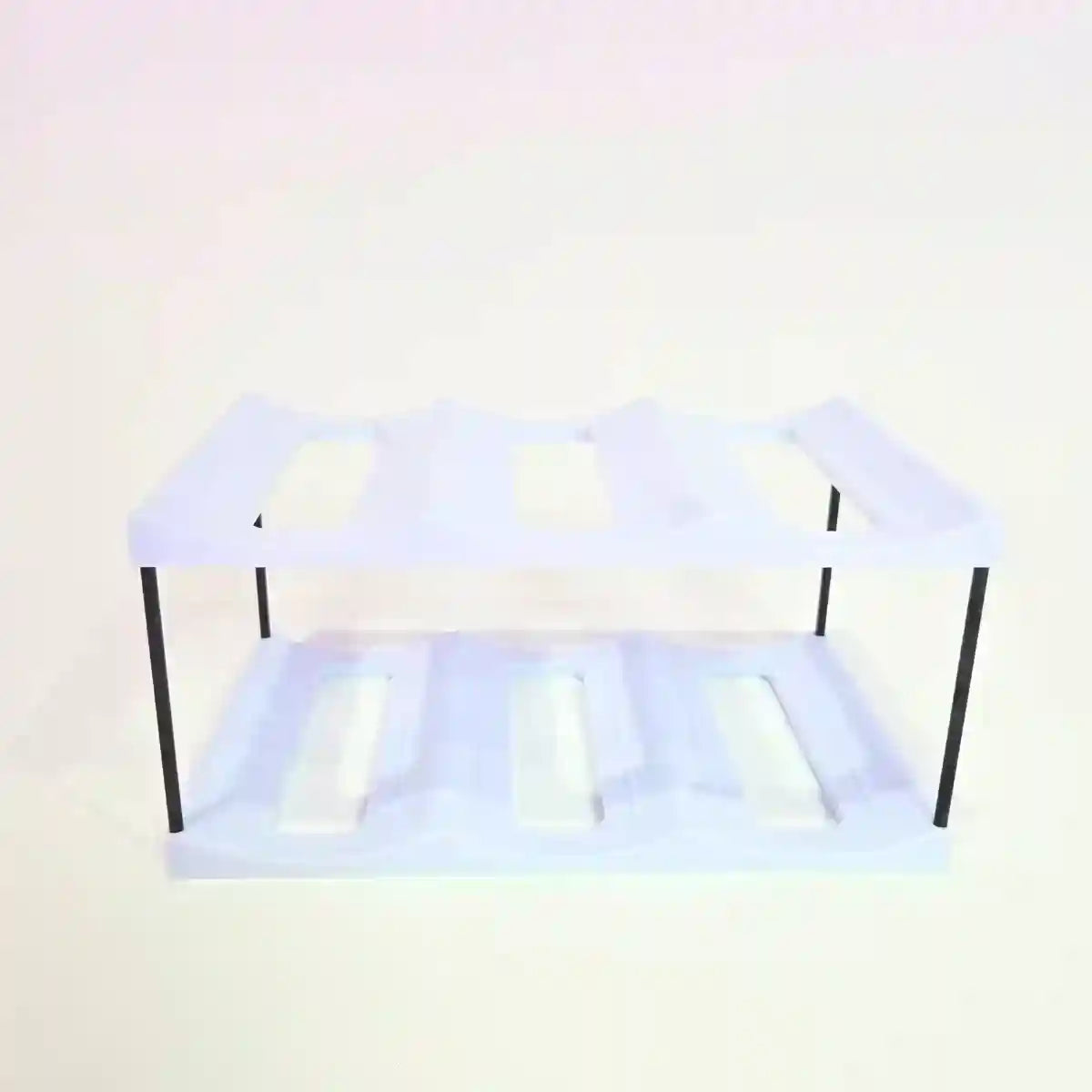 Clear plastic shelf with black metal legs on a white background
