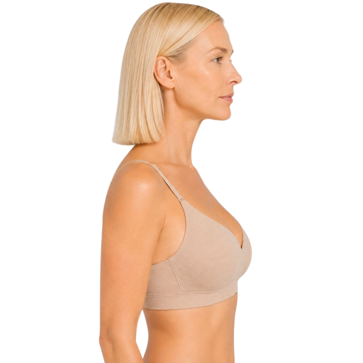 Woman wearing a beige bralette on a white background