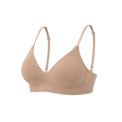 Beige bra on a white background