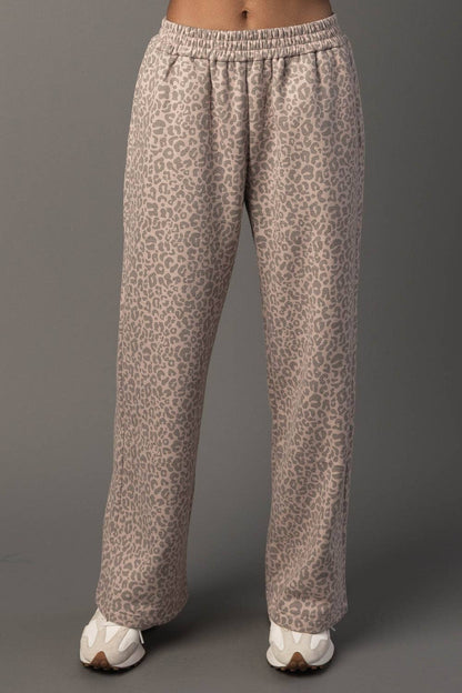 Leopard print pants on a gray background