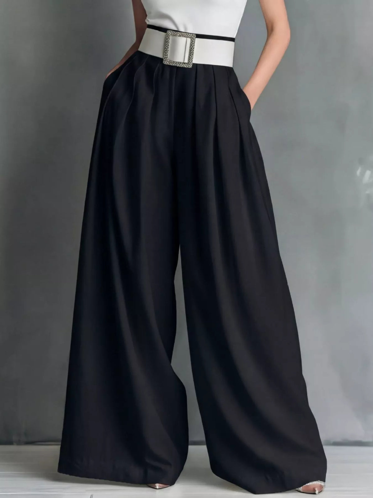 High-waisted wide-leg pants, styled photo