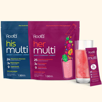 Rootaid his multi and her multi supplement packages with a glass of pink drink.