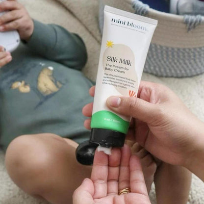mini bloom Silk Milk kids body lotion, close view