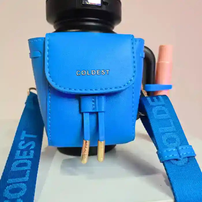 Blue camera accessory with 'COLDEST' branding on a neutral background