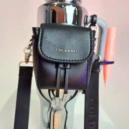 Black leather pouch with 'COLDEST' branding attached to a metallic water bottle.
