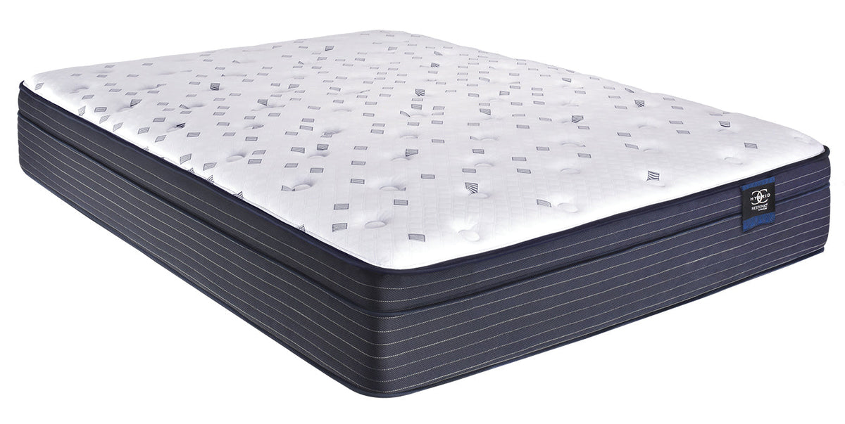Restonic ComfortCare Hybrid Euro Top mattress shown on a bed frame