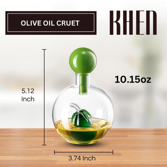 Olive oil cruet with green cap and measurement details on a wooden surface.