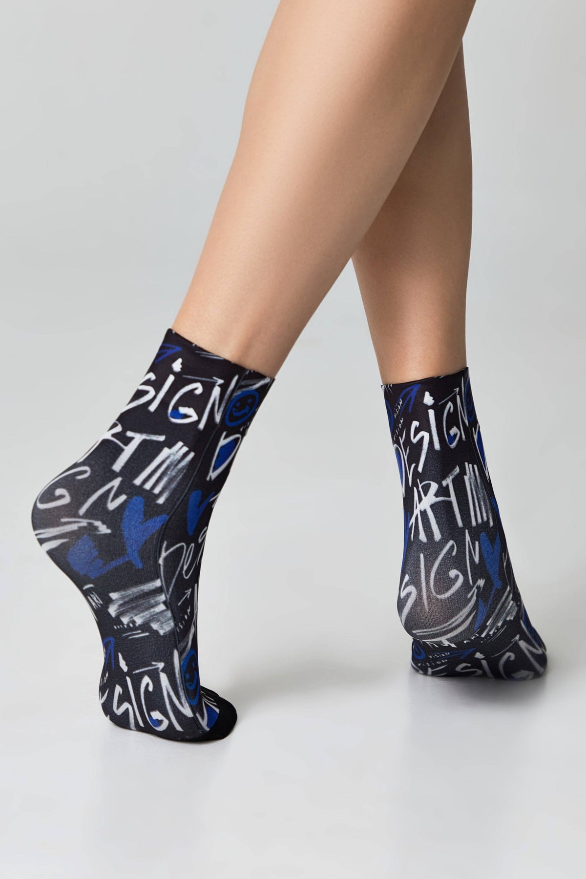 Conte Fantasy 910 dense socks with art designs, styled photo
