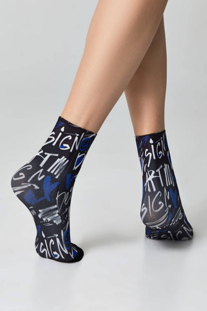 Conte Fantasy 910 dense socks with art designs, styled photo