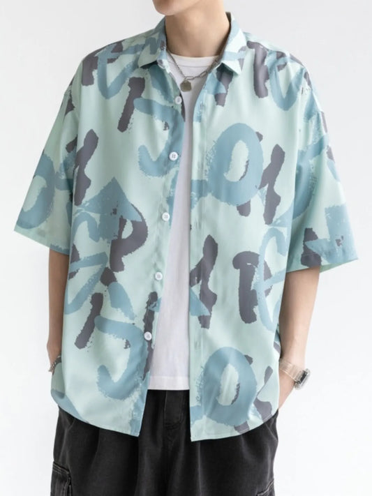 Person wearing a light blue camouflage-patterned shirt with a white background