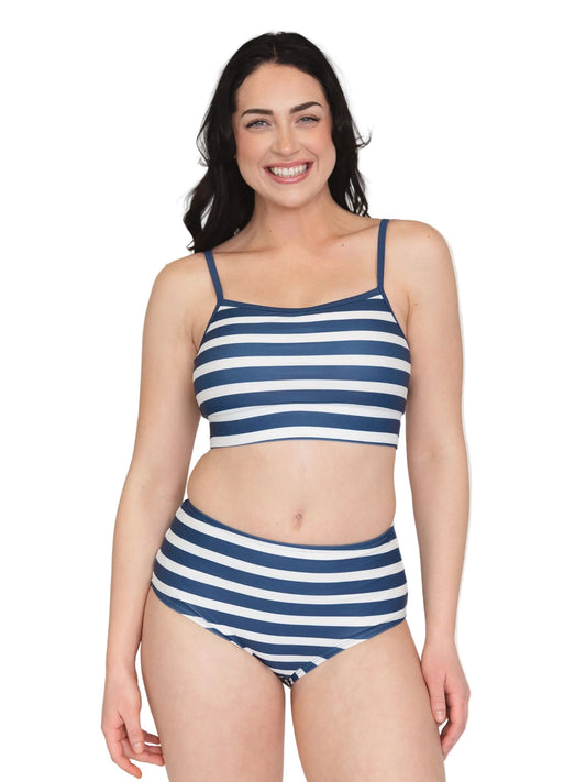 A woman modeling a two-piece bikini swimsuit with navy blue and white horizontal stripes against a plain white background.