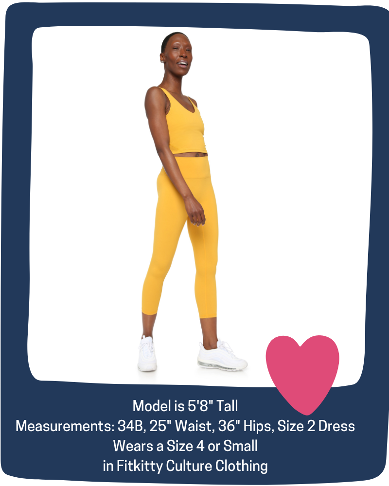 Woman wearing a yellow outfit with text about model measurements and clothing size.