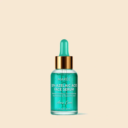 A 10% Azelaic Acid Face Serum by Marée in a clear glass dropper bottle with a metallic gold collar and a translucent teal-green rubber dropper top. The product is centered against a solid, warm beige background.