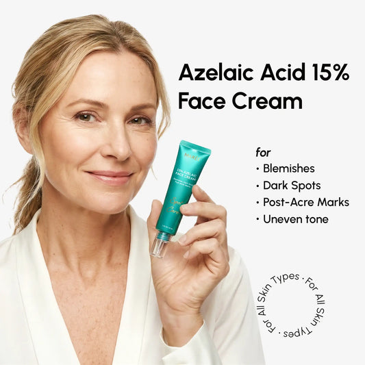 Woman holding a tube of Azelaic Acid 15% Face Cream with product details on a white background