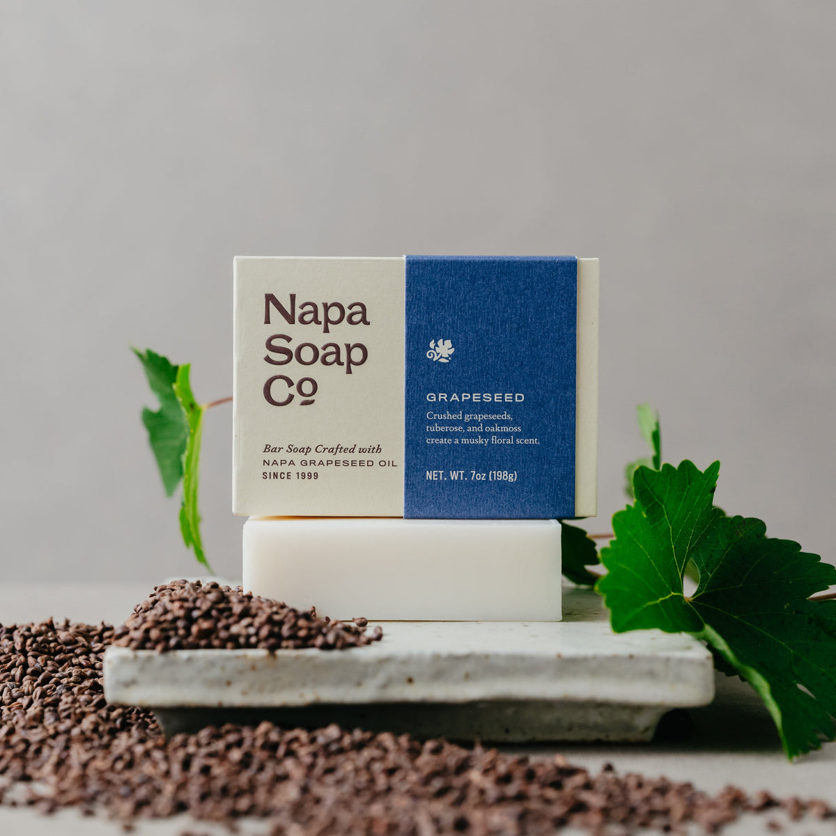 Napa Soap Co. soap bar with packaging on a gray background