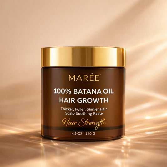Jar of Maree 100% Batana Oil Hair Growth Paste on a warm beige background