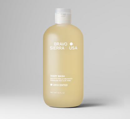 Beige body wash bottle with 'Bravo Sierra USA' branding on a gray background