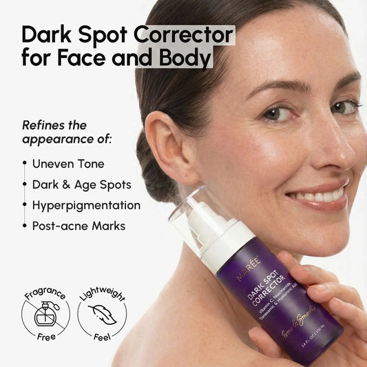 Woman holding a dark spot corrector bottle with product features listed on a white background