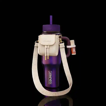 Purple water bottle with beige holder on a black background