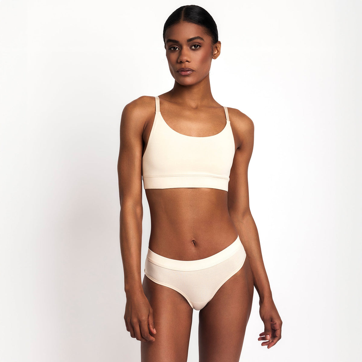 Organic Cotton Mid-Rise Brief in Latte, worn as a set on a white background
