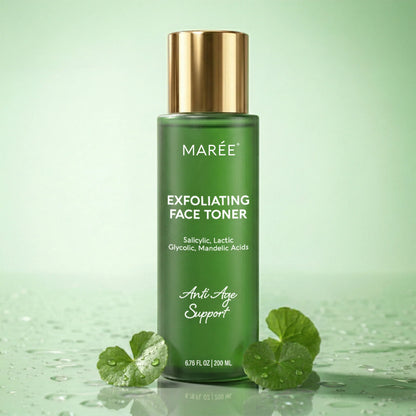 A green bottle of MARÉE Exfoliating Face Toner with a metallic gold cap, set against a soft mint green background with water droplets and green leaves at the base.