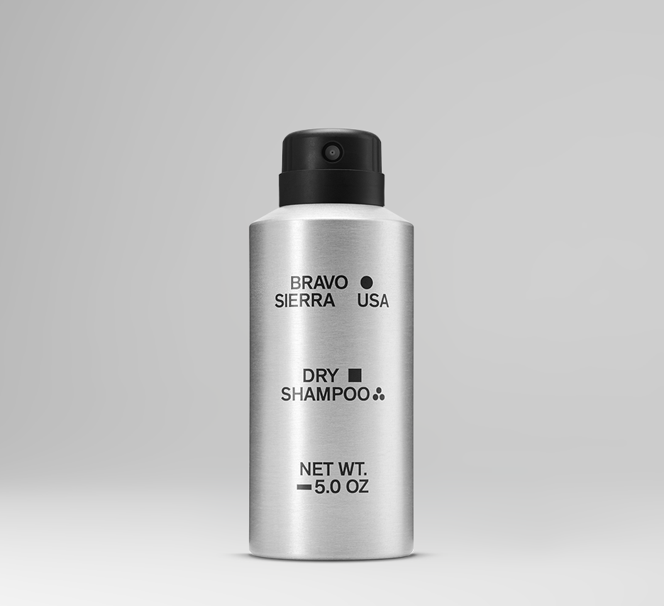 Silver bottle of Bravo Sierra USA dry shampoo on a gray background