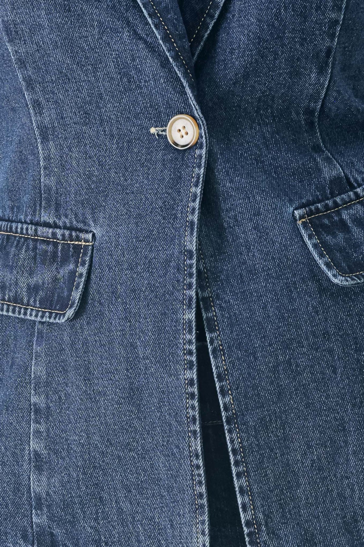 Fabric swatch showing the 90% cotton, 10% polyester washed denim in denim blue.