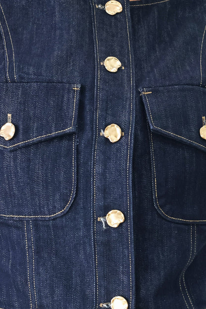 Close-up of the indigo cotton-blend denim fabric used for the Iconic Indigo crop vest.