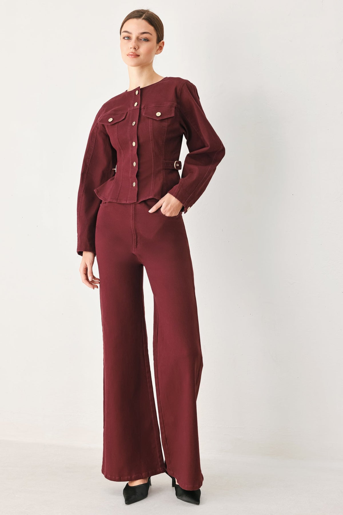 Front view of the burgundy woven jacket showing the round neck and button-down closure.