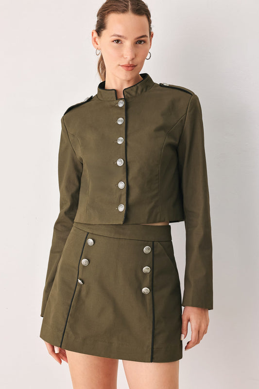 Olive utility crop jacket with shoulder tabs and a front button-down closure.