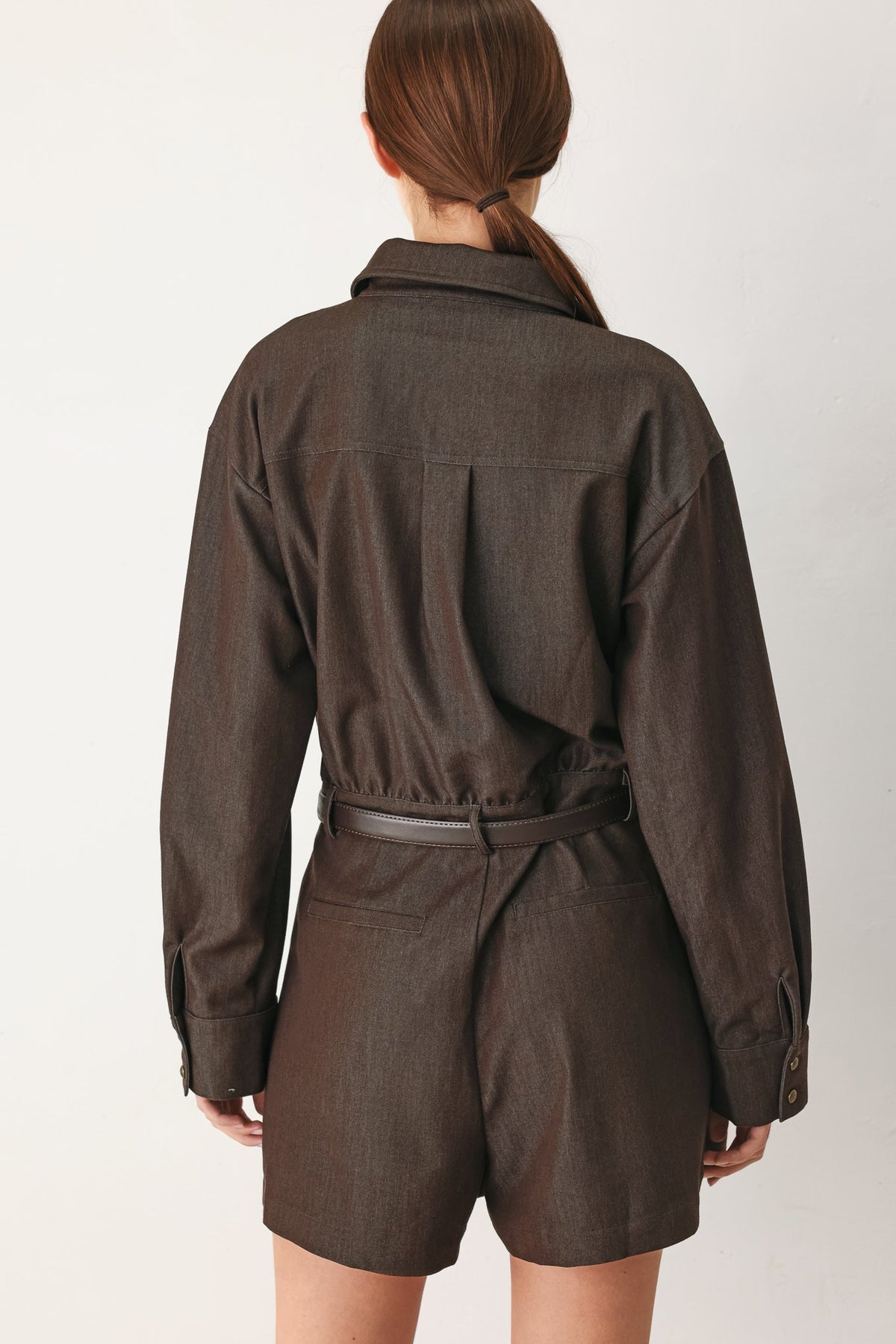 Pocket and belt detail on the Flying Tomato Rich Cocoa woven romper.