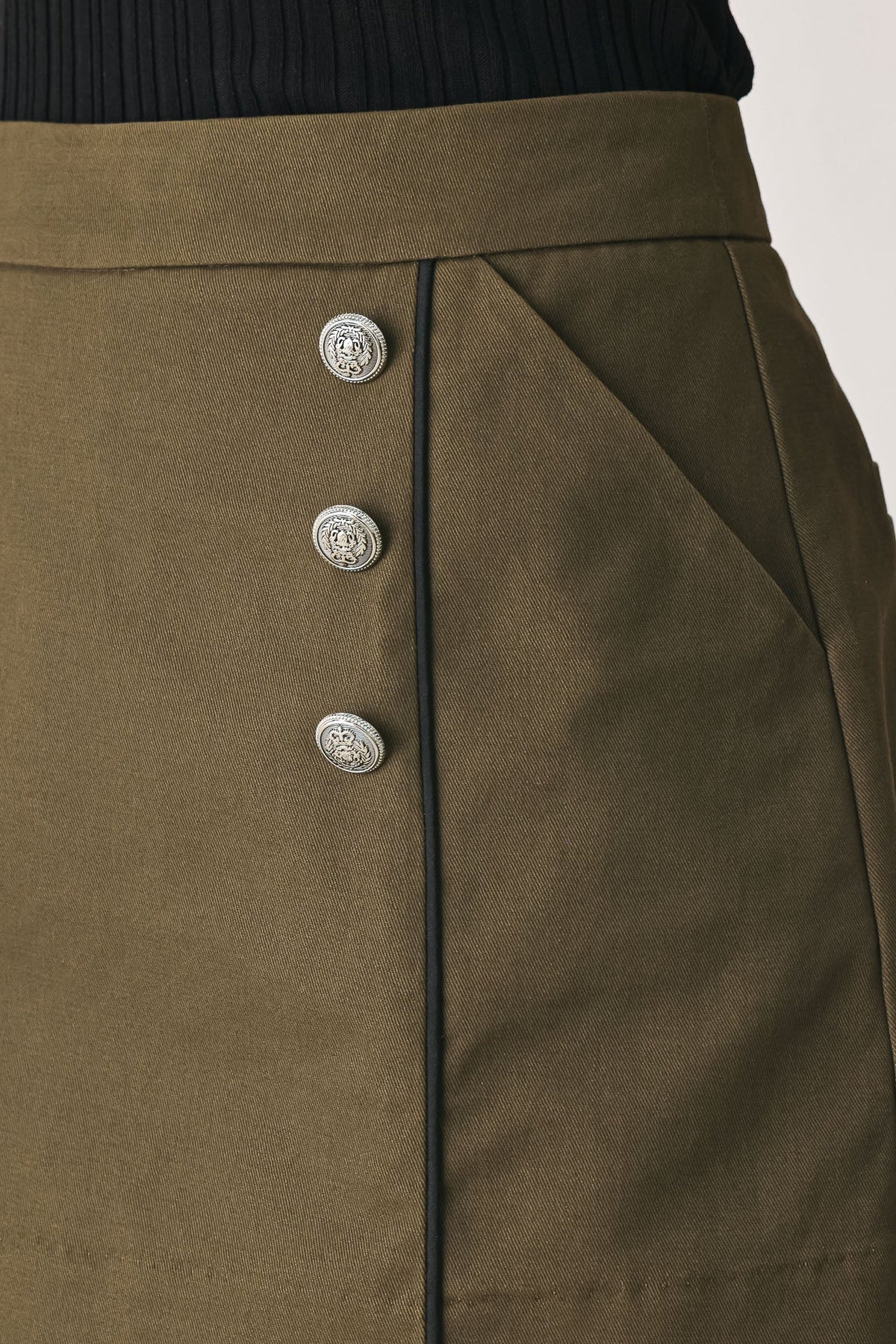 Ranger Green skort styled with a fitted top for elevated everyday dressing.