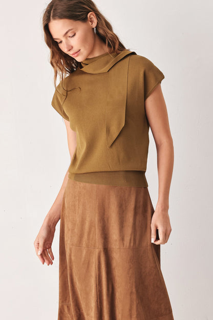Cap-sleeve sweater knit top with a tie at the neckline, shown on a model.
