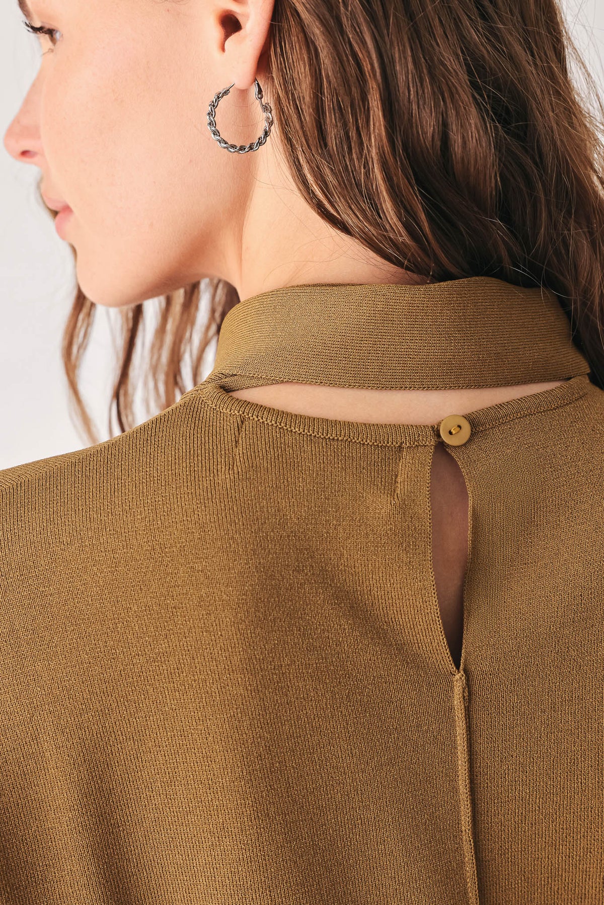 Neckline tie and cap sleeve detail on the Flying Tomato Amberglow sweater top.