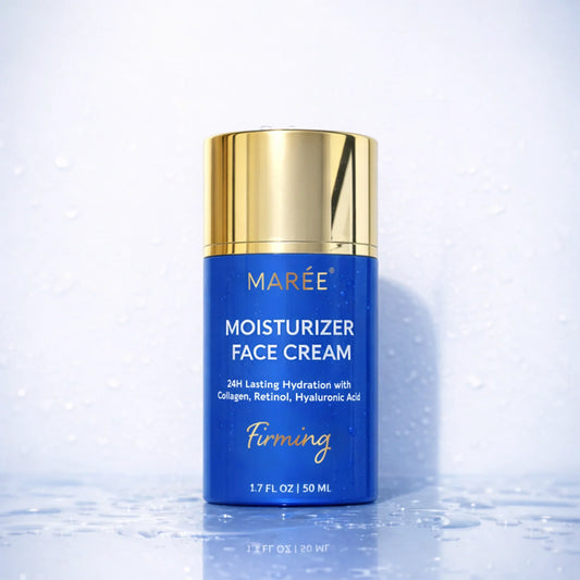 A bottle of MARÉE Moisturizer Face Cream with a metallic blue body and a shiny gold cap, set on a light blue water-droplet surface.