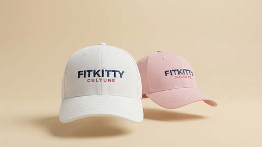 Two baseball caps with 'FITKITTY CULTURE' text on a beige background