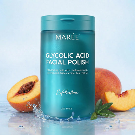 Blue container of MARÓE Glycolic Acid Facial Polish with peaches and water droplets on a light blue background